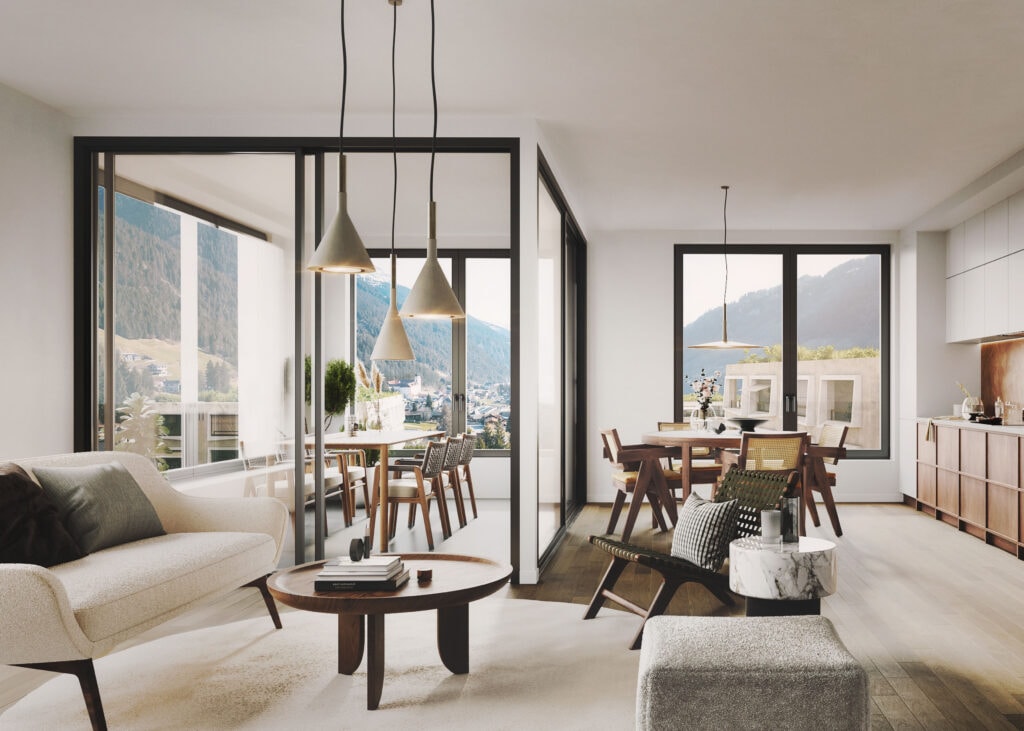 A living room with a view of mountains.